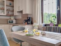 A kitchen or kitchenette at Riverside Apartment in Oed-Öhling