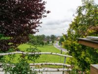 A garden outside Riverside Apartment in Oed-Öhling