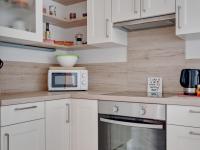 A kitchen or kitchenette at Riverside Apartment in Oed-Öhling