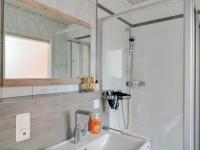 A bathroom at Riverside Apartment in Oed-Öhling