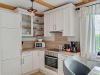 A kitchen or kitchenette at Riverside Apartment in Oed-Öhling
