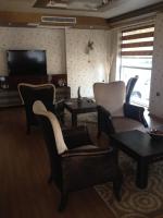A television and/or entertainment centre at My Liva Hotel