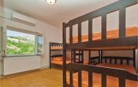 Postel nebo postele na pokoji v ubytování Holiday Home Podorah I