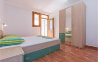 Postel nebo postele na pokoji v ubytování Holiday Apartment Krvavica 08