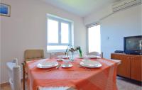Televízia a/alebo spoločenská miestnosť v ubytovaní Apartment Kukljica Kukljica Ul,