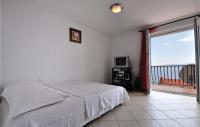Postel nebo postele na pokoji v ubytování Apartment P, Porta I