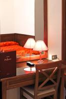 Posteľ alebo postele v izbe v ubytovaní Hotel Pavone