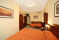 Posteľ alebo postele v izbe v ubytovaní Hotel Pavone