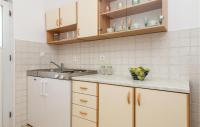 a kitchen with a sink and a counter top at Awesome Apartment In Rijeka With Wifi in Rijeka
