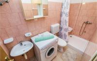 a bathroom with a sink and a toilet and a shower at Awesome Apartment In Rijeka With Wifi in Rijeka
