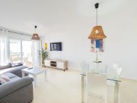 A television and/or entertainment centre at Cubo's La Terraza del Mar