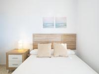 A bed or beds in a room at Cubo's La Terraza del Mar