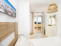 A bed or beds in a room at Cubo's La Terraza del Mar