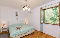 Posteľ alebo postele v izbe v ubytovaní Holiday Home Slano 45