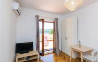 Televízia a/alebo spoločenská miestnosť v ubytovaní Holiday Home Slano 45