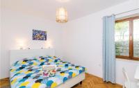 Posteľ alebo postele v izbe v ubytovaní Holiday Home Slano 45