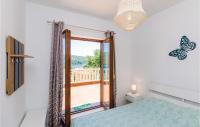 Posteľ alebo postele v izbe v ubytovaní Holiday Home Slano 45