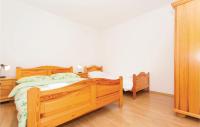 Posteľ alebo postele v izbe v ubytovaní Lovely Apartment In Malinska With Wifi