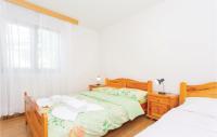 Posteľ alebo postele v izbe v ubytovaní Lovely Apartment In Malinska With Wifi