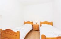Posteľ alebo postele v izbe v ubytovaní Lovely Apartment In Malinska With Wifi