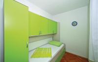 Posteľ alebo postele v izbe v ubytovaní Apartment Trogir With Sea View 05
