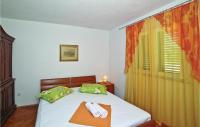 Posteľ alebo postele v izbe v ubytovaní Apartment Trogir With Sea View 05
