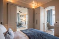 Postel nebo postele na pokoji v ubytování Goldmädchen 93 - Beach House