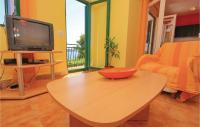 Televízia a/alebo spoločenská miestnosť v ubytovaní Apartment Korcula-Prizba Croatia
