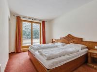 Łóżko lub łóżka w pokoju w obiekcie Chalet apartment in Saalbach-Hinterglemm