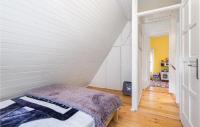 En eller flere senge i et v&aelig;relse p&aring; Nice Home In Begovo Razdolje With Wifi