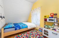 En eller flere senge i et v&aelig;relse p&aring; Nice Home In Begovo Razdolje With Wifi