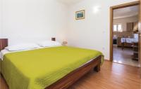 Posteľ alebo postele v izbe v ubytovaní Holiday Home Povlja With Sea View I