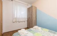 Posteľ alebo postele v izbe v ubytovaní Gorgeous Apartment In Lukovo Sugarje