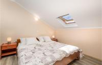 Posteľ alebo postele v izbe v ubytovaní Cozy Home In Zubovici