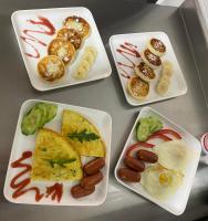 a table with three plates of food on it at Four Seasons In Carpathians in Migovo