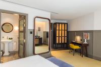 Ann Siang House, The Unlimited Collection managed by The Ascott Limitedにあるベッド