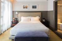 Ann Siang House, The Unlimited Collection managed by The Ascott Limitedにあるベッド