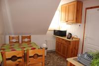A kitchen or kitchenette at Penzión U Johna