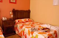 Postel nebo postele na pokoji v ubytování Hotel Rural Miguel Angel