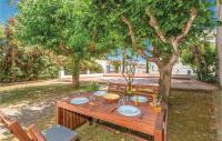 A garden outside Cozy Home In Tossa De Mar With Wifi