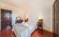 A bed or beds in a room at Cozy Home In Tossa De Mar With Wifi