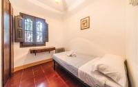 A bed or beds in a room at Cozy Home In Tossa De Mar With Wifi