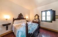 A bed or beds in a room at Cozy Home In Tossa De Mar With Wifi