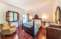 A bed or beds in a room at Cozy Home In Tossa De Mar With Wifi