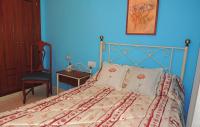 A bed or beds in a room at Cozy Apartment In Jerez De La Frontera