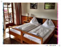 Łóżko lub łóżka w pokoju w obiekcie Hotel St. Florian - Kaprun
