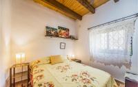 A bed or beds in a room at El Collado