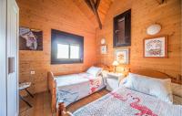 A bed or beds in a room at El Collado