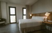 Postel nebo postele na pokoji v ubytování Petit Palace Vargas