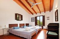 Posteľ alebo postele v izbe v ubytovaní Villa Es Bosquet by Slow Villas
